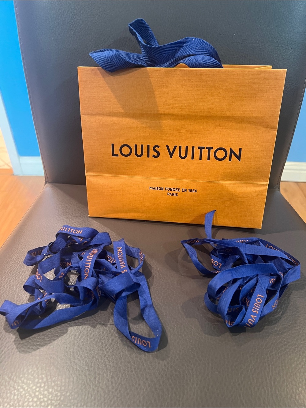 Louis Vuitton bag and 2 sets of ribbon
